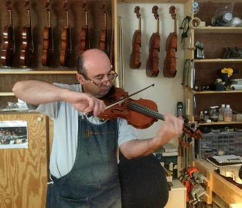 Testing the sound of a new violin